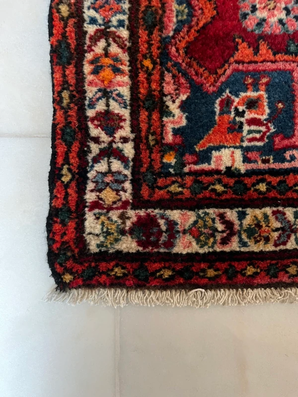 rénovation lisière tapis d'iran après