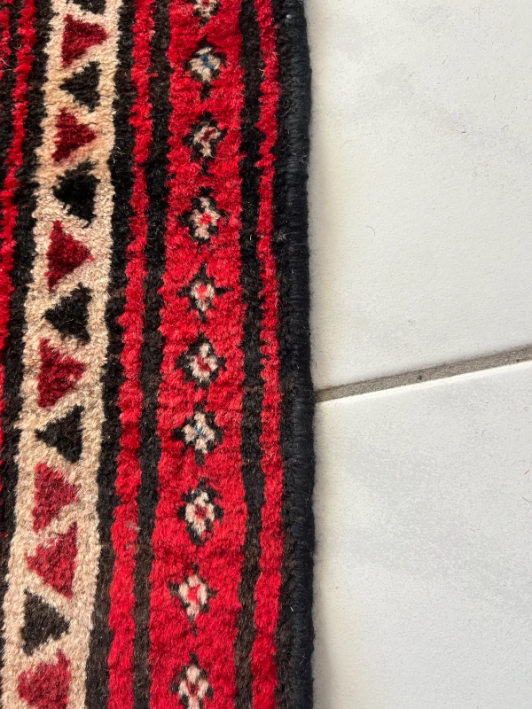 bordure tapis pakistan bokhara réparée
