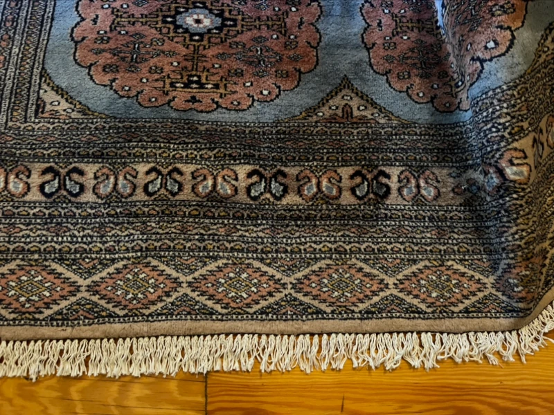 frange tapis pakistan bokhara abimée