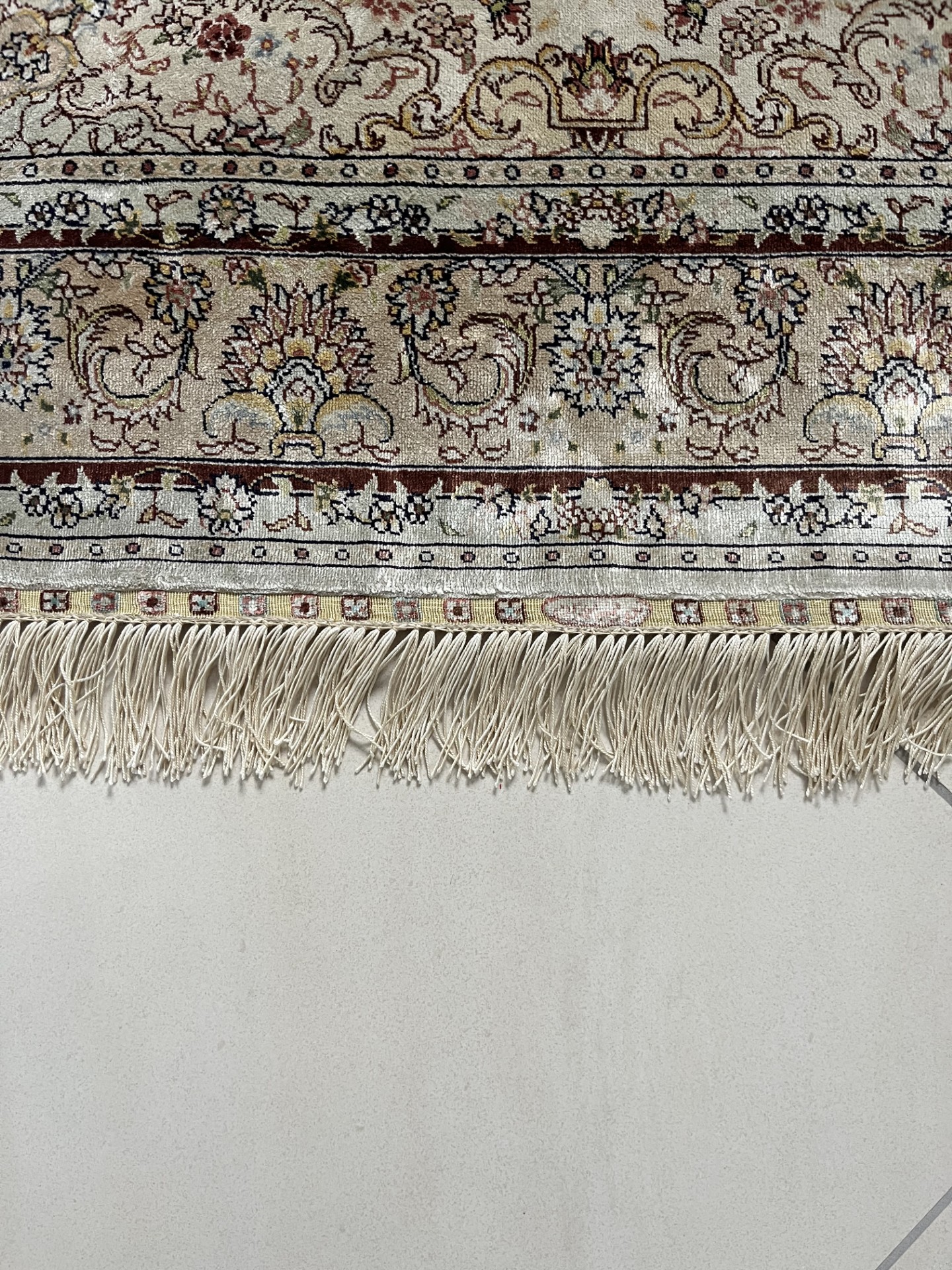 rénovation des franges de tapis